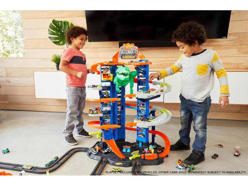 Garage Hot Wheels con Pistas y T-Rex gigante